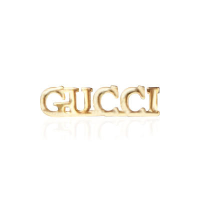 Gouden tandsieraad Gucci – luxueus 18 kt gold tooth gem met GG-ontwerp