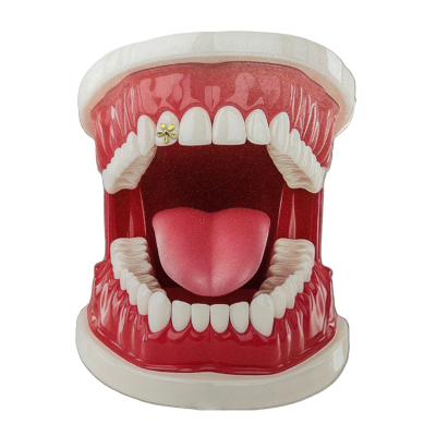 Gouden tooth gem bloemetje – 18 kt flower design