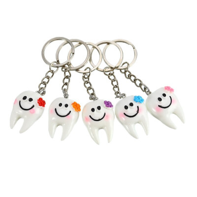 Sleutelhanger tand met gezichtje – smile accessoire